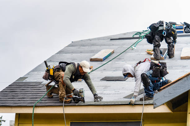 Professional Roofing technician working in Burlington, VT